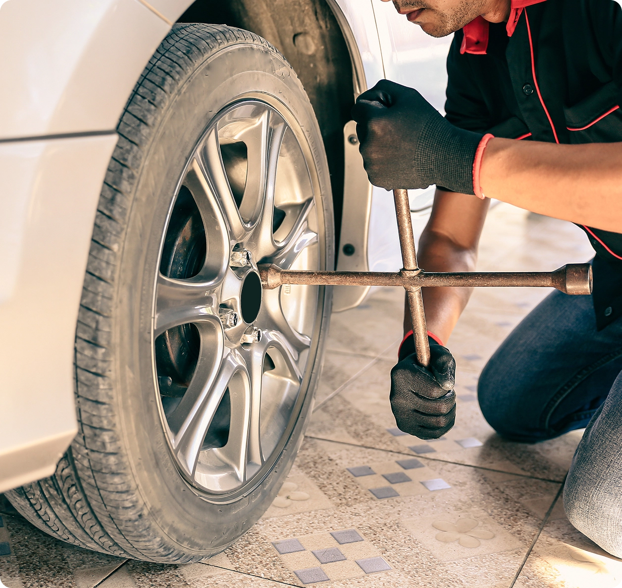 Mechanic-Checking-Tire