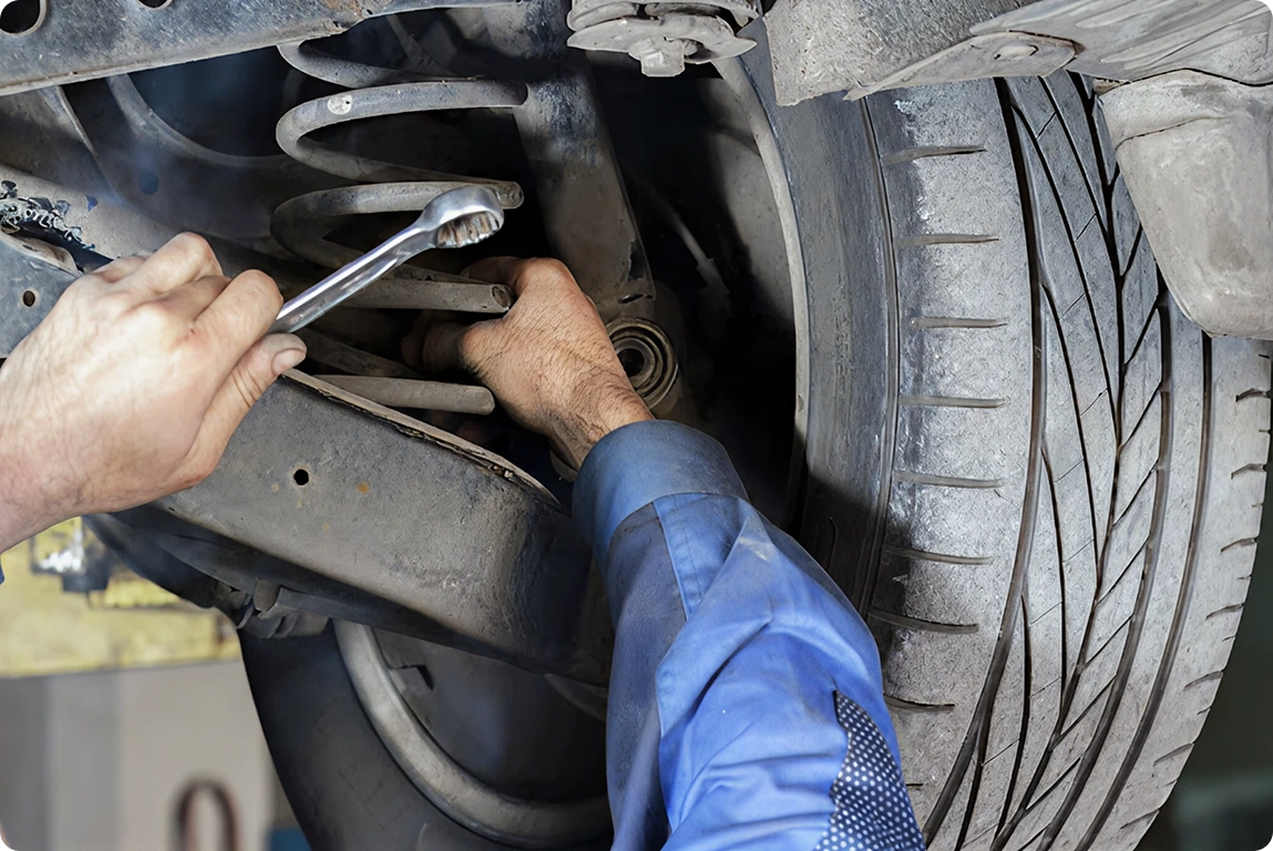 Professional worker repairman changing car wheel