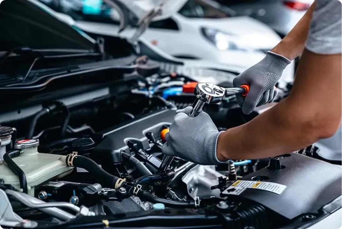 mechanic checking engine