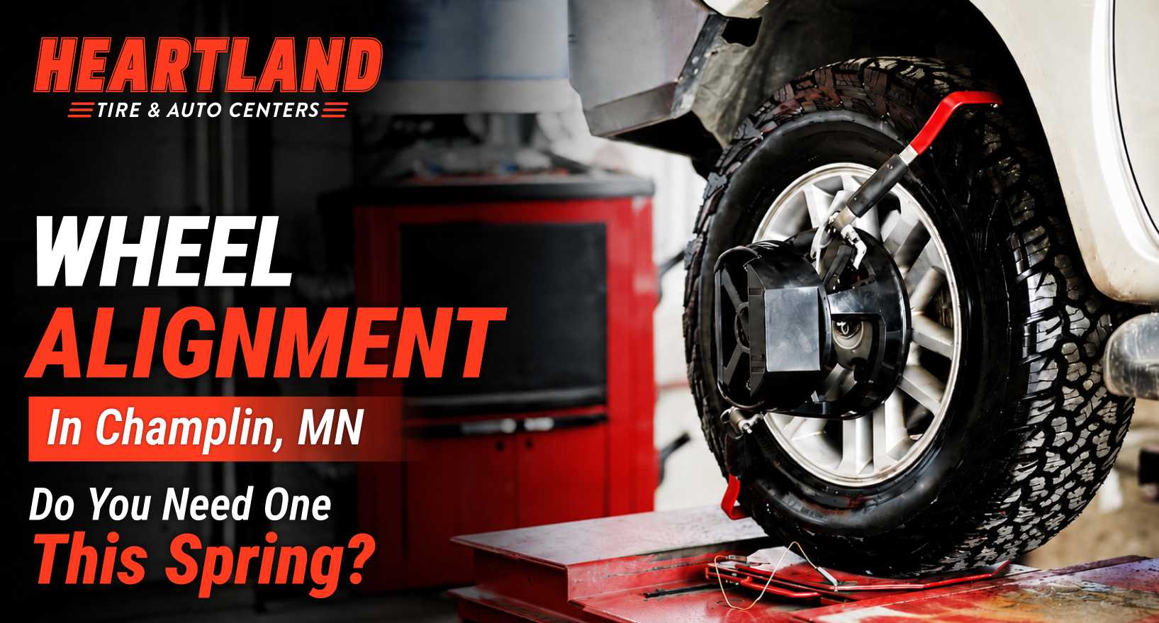 Technician performing wheel alignment in Champlin MN auto repair shop