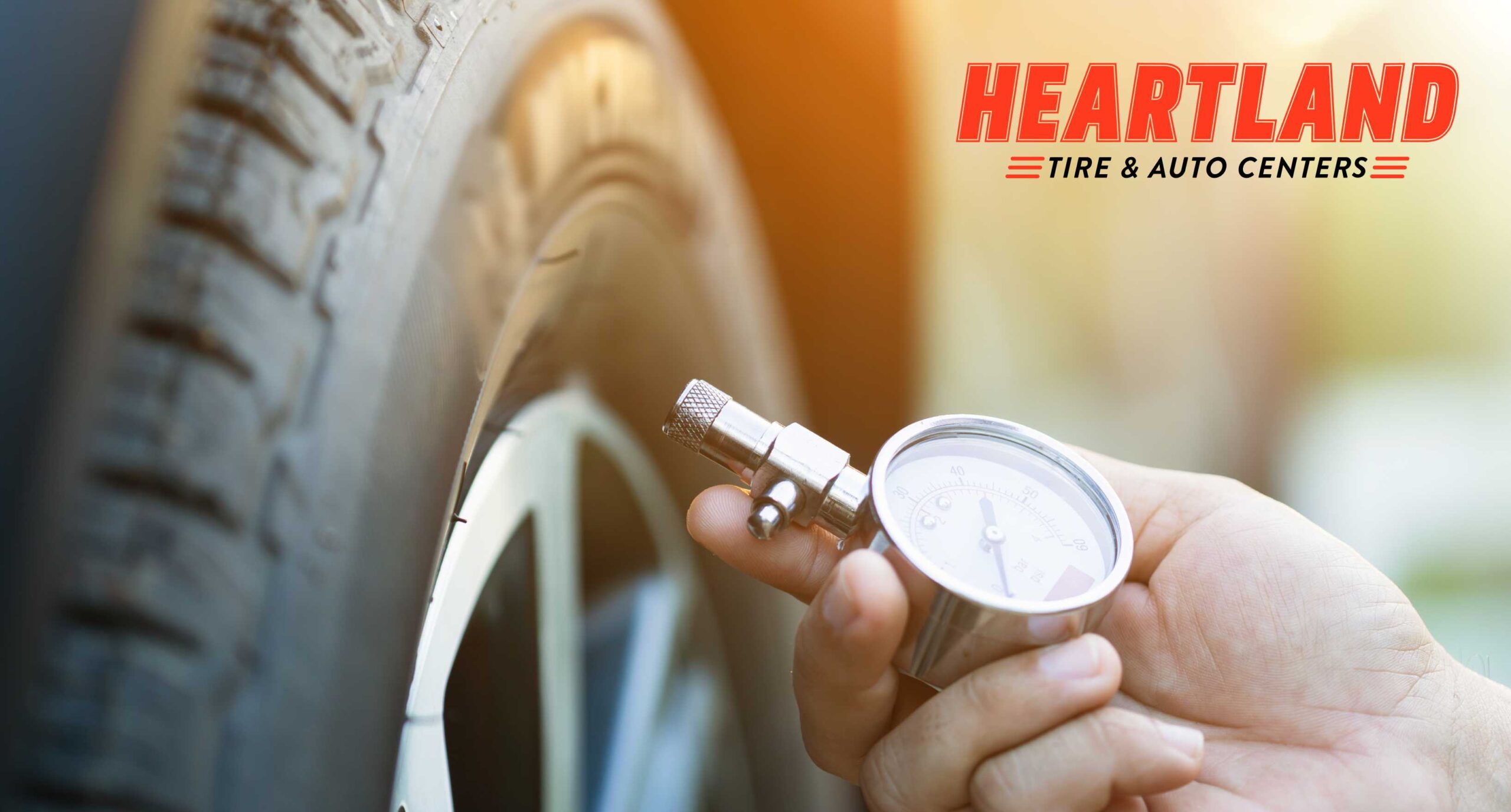Ramsey MN Tire Pressure Guide showing technician checking vehicle tire PSI