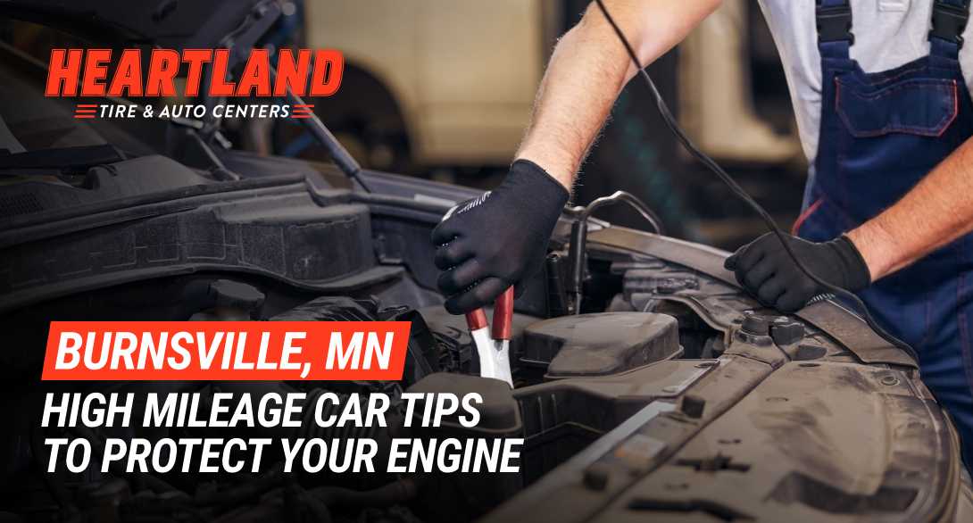 Technician inspecting a high-mileage vehicle engine in Burnsville MN