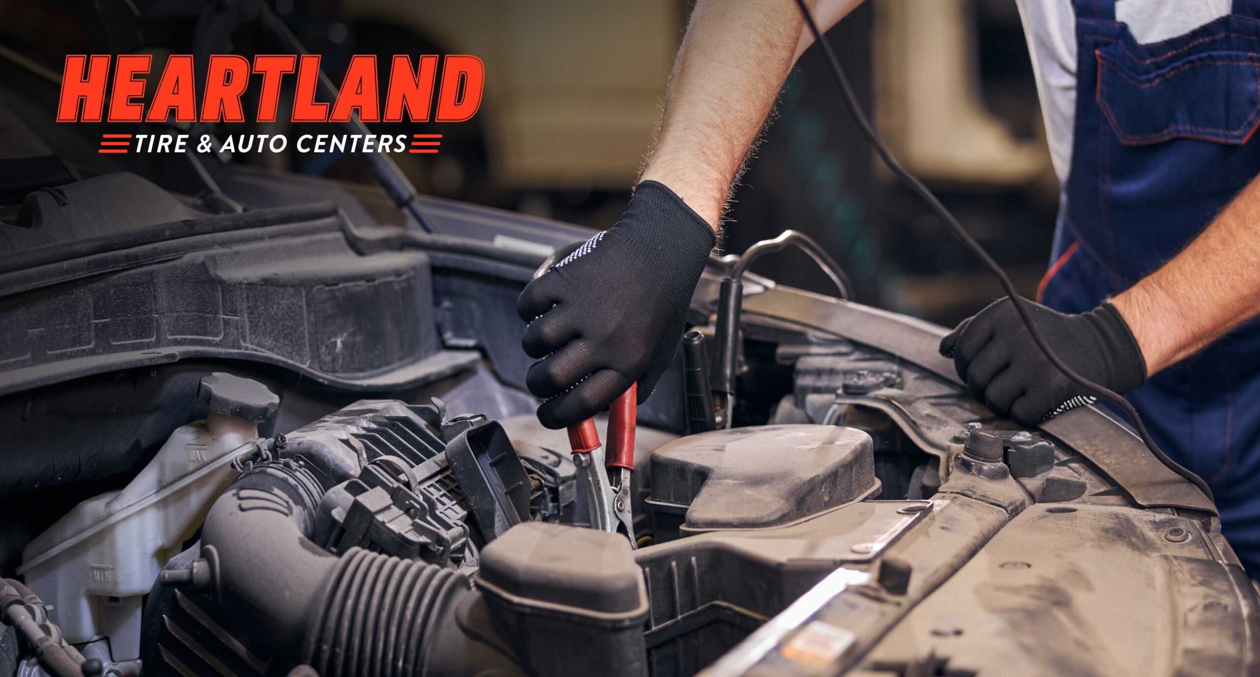 Technician performing routine vehicle maintenance in Monticello MN